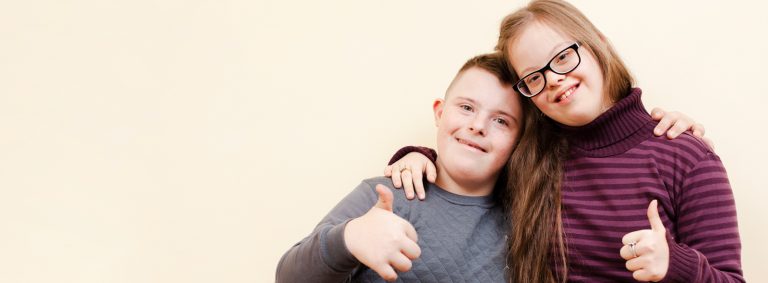 Happy siblings smiling